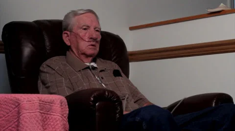 Elderly man on oxygen WIDE.mp4 Stock Footage 29998117