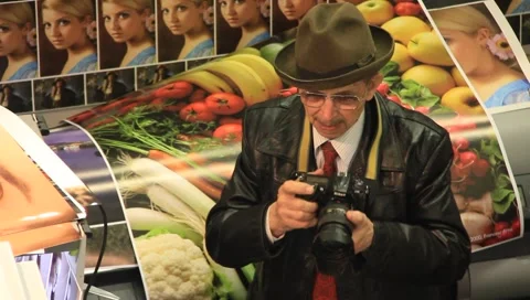 Elderly man with photocamera Stock Footage