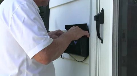 Elderly man picking up mail 動画素材 53831435