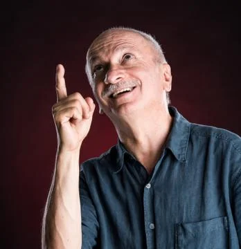 Elderly man pointing 写真素材