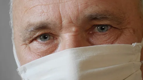 Elderly man in protective mask Видео 129297280