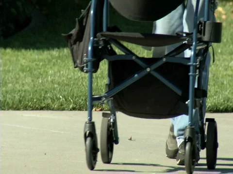 Elderly man with pushcart Stock Footage 555243