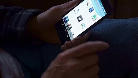 Elderly Man Scanning Apps on Cell Phone Video stock 83959470