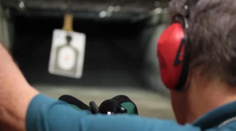 Elderly Man Sends Shooting Target Out to Proper Distance Stock Footage 39540643