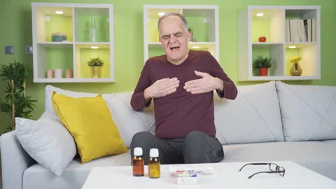 Elderly man with shortness of breath problem. Stock Footage 235444500