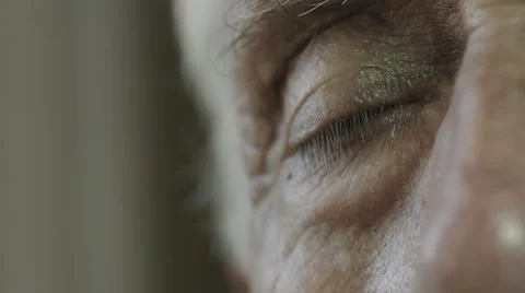 Elderly man sitting alone deep in his thoughts: pensive old man, sad, sadness Stock Footage 42973538