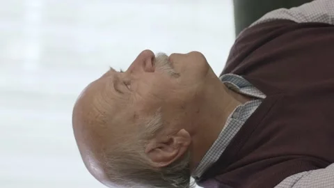 Elderly man sitting thoughtfully and sadly at home or nursing home. Stock Footage 196111276
