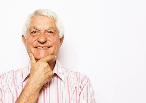 Elderly Man Smiling Face Expression Concept. Over white background. Stock Photos