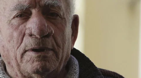 Elderly man speaking to the camera telling of his life Stock Footage 63415498