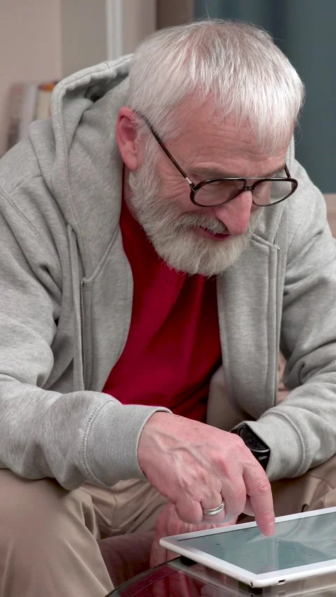 Elderly man with tablet Stock Footage 308776594
