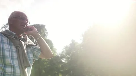 An elderly man talking in his mobile phone Video stock 11289177