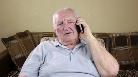 Elderly man talking on the phone Stock-Footage 163703324