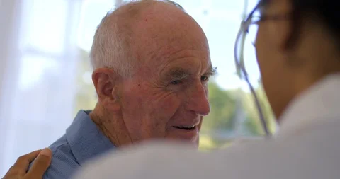 Elderly man talks to his friendly doctor. Stock-Footage 88371861