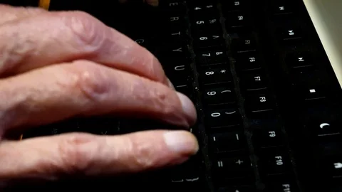 Elderly Man Typing on PC Keyboard 動画素材 83960035