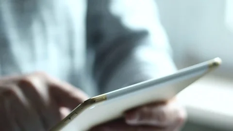 Elderly Man Using Tablet. Bright Sunny Day, The Light Illuminates The Room. Video stock 73020006