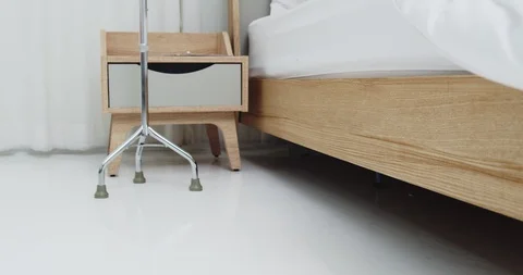 Elderly man wake up and walking with tripod cane Stock Footage 127082264