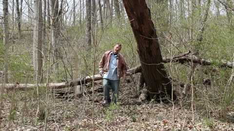 Elderly man walking in the forest 動画素材 22772082