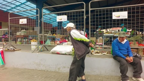 Elderly Man Walking In Front Of Local Market Stock Footage 88334704