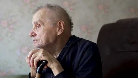 Elderly Man with Walking Stick, Subtle Movement and Emotional Depth Stock Footage 306085032