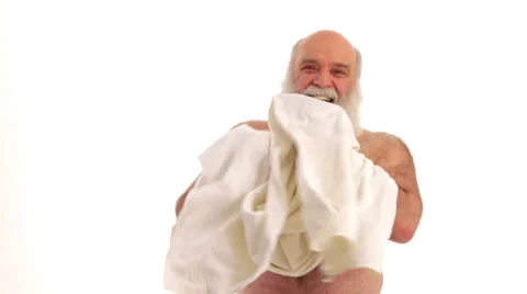 Elderly man with white beard drying his face Video stock 24634735