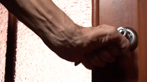 An Elderly Man's Hand Opens the Door to the Light Room Stock Footage 151311893