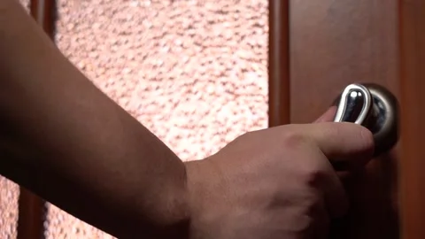 An Elderly Man's Hand Opens the Door to the Light Room Stock Footage 166503314
