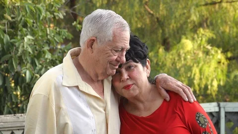 Elderly married couple hugging, looking happy together Vídeos de archivo 116200375
