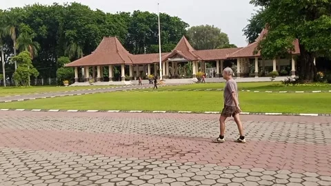 Elderly men doing recovery excercise jogging in pandemic Stock Footage 145572656