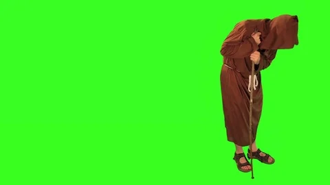 Elderly monk on stick Stock Footage 76226877