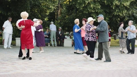 Elderly people dancing in the Park Stock Footage 76891474