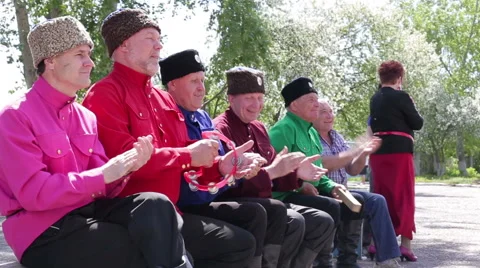 Elderly people sitting on bench Stock Footage 63760457