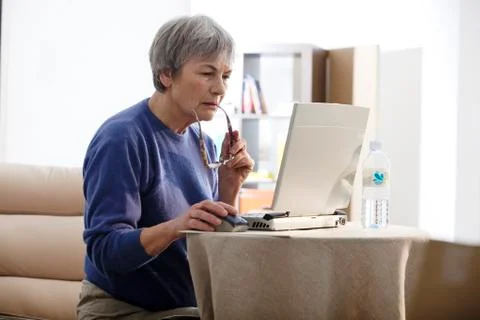 Elderly person, computer Stock Photos