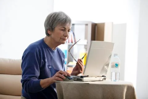Elderly person, computer Stock Photos