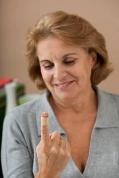 Elderly person dressing Stock Photos