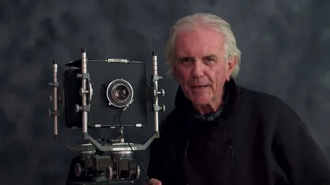 Elderly photographer Stock-Footage 84762480