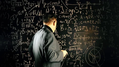 Elderly professor giving a lecture, mathematical formula on blackboard Stock Footage 128986524