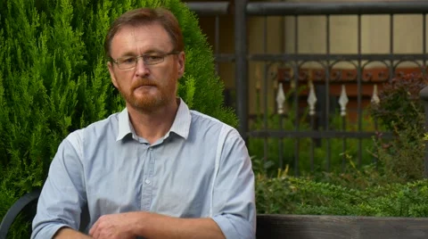 Elderly Red-Bearded Man Has a Rest in Park Stock Footage 67537392