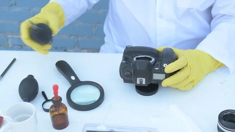 Elderly solid person in white dressing gown, cap, medical mask, glasses clean Stock Footage 93428863