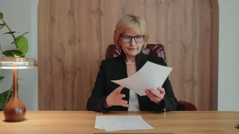 Elderly student crumpling document after review Stock Footage 307417436