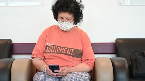 An elderly is taking a rest Stock Footage 204762658