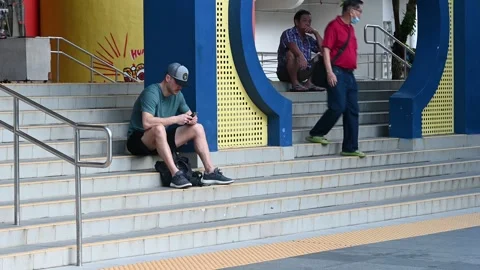 An elderly is taking a rest Stock Footage 240382013