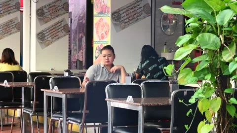 An elderly is taking a rest Stock Footage 240382431