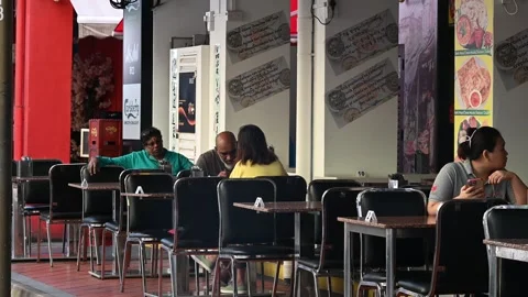 An elderly is taking a rest Stock Footage 240382560