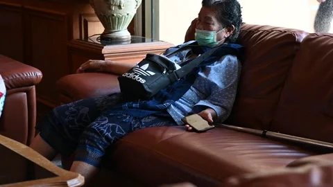 An elderly is taking a rest Video stock 240387712