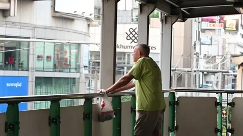 An elderly is taking a rest Video stock 240388644