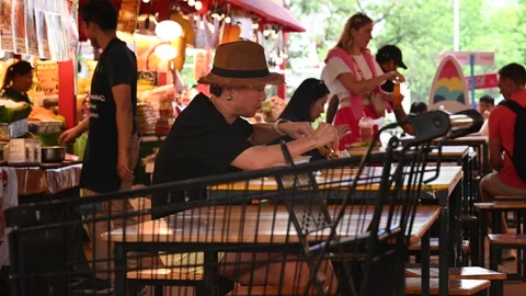An elderly is taking a rest Stock Footage 240401985