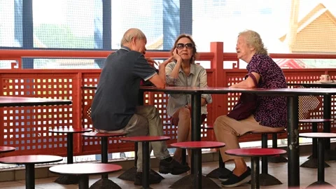 An elderly is taking a rest Stock Footage 240410359