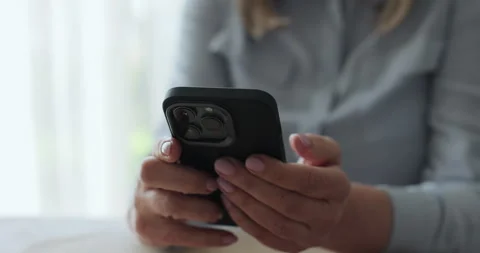 Elderly woman texting using mobile phone. Senior, technology, lifestyle Stock-Footage 334054904