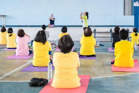 Elderly in a yoga exercise posture Stock Photos