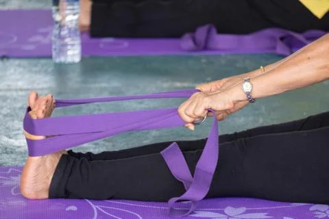 Elderly in a yoga exercise posture Foto stock